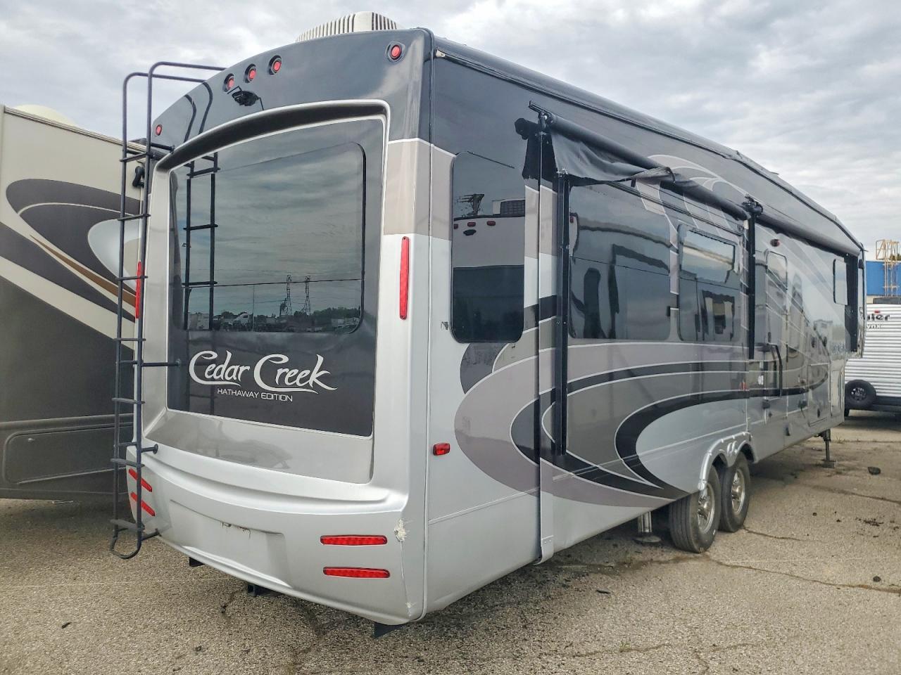 2018 Cedar creek 5th wheel VIN 4X4FCRM24JS220226 COPART salvage auction — Side, MI - CERTIFICATE OF TITLE, sold $16,100 on 2026-06-23 (photo 4)