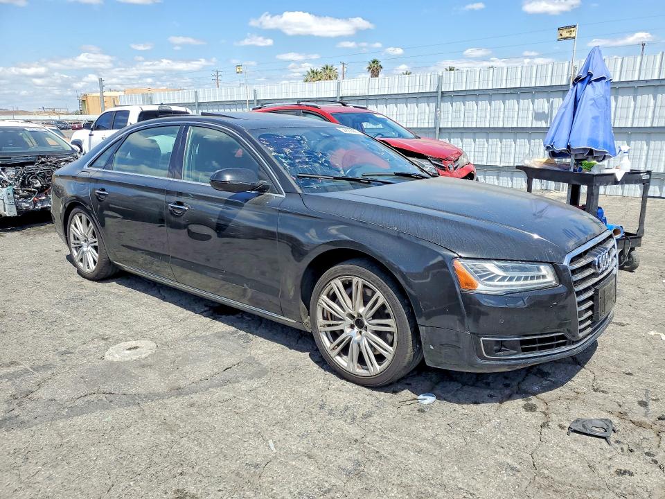 2016 Audi A8 VIN WAU34AFD6GN010477 COPART salvage auction — NORMAL WEAR, Ca - Dis/Dlr/Exp Only Clean Title, sold $5,000 on 2026-07-09 (photo 4)