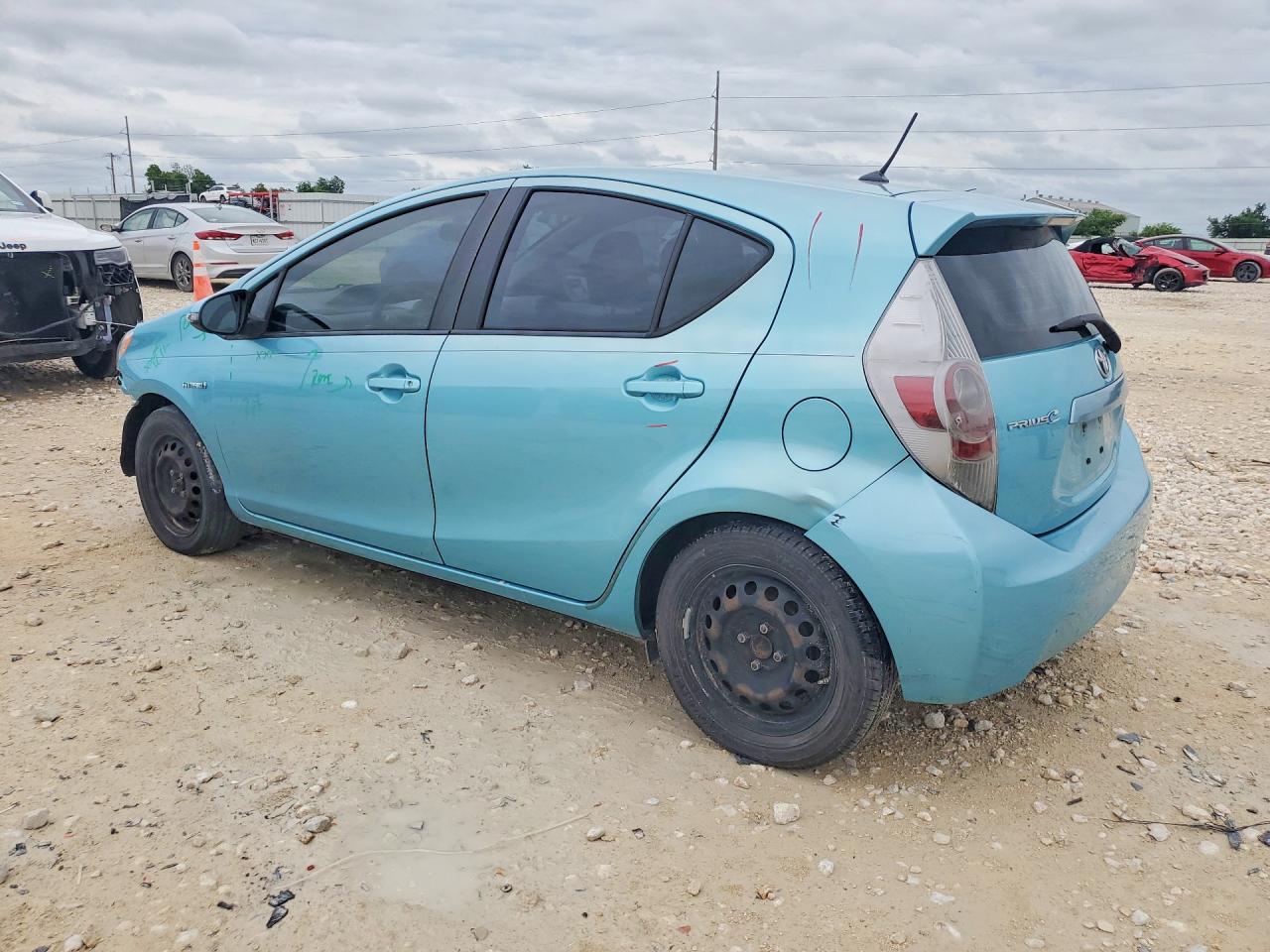 2012 Toyota Prius C VIN JTDKDTB37C1018273 COPART salvage auction — Front End, TX - SALVAGE VEHICLE TITLE (P), sold $475 on 2026-07-09 (photo 2)