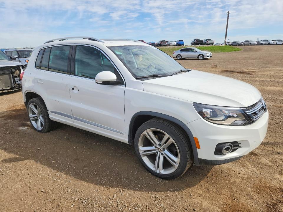 2014 Volkswagen Tiguan VIN WVGJV3AX7EW548502 COPART salvage auction — SIDE, Ab - Bos - Salvage, sold $200 on 2026-07-28 (photo 4)