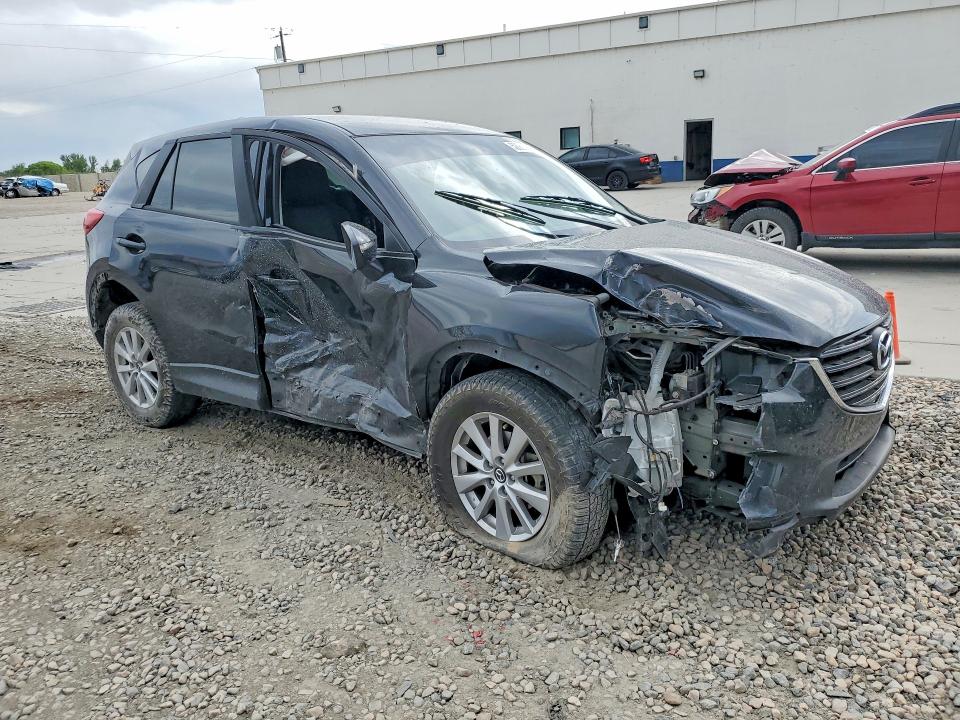 2016 Mazda VIN JM3KE2BY4G0866102 COPART salvage auction — SIDE, Ut - Salvage Certificate, sold $2,200 on 2026-07-27 (photo 4)