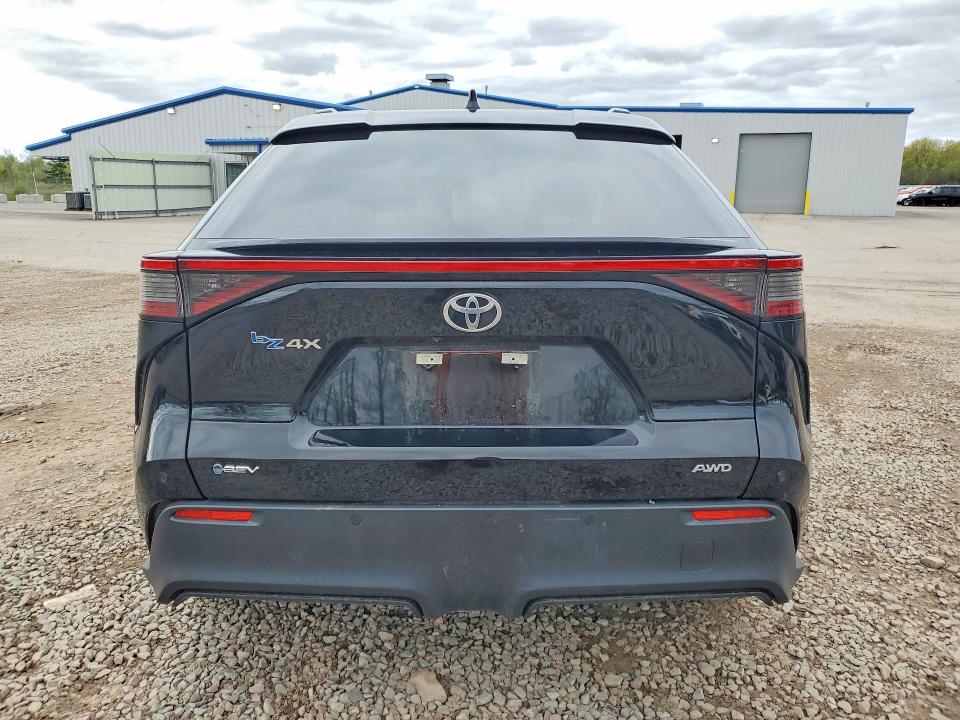 2025 Toyota Bz4x VIN JTMABACA0SA105465 COPART salvage auction — SIDE, NY - MV-907A SALVAGE CERTIFICATE, sold $12,900 on 2026-07-09 (photo 6)