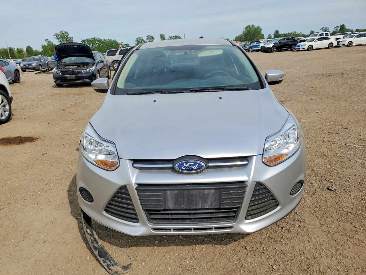 2014 Ford Focus VIN 1FADP3F25EL410991 COPART salvage auction — Side, IL - SALVAGE CERTIFICATE, sold $725 on 2026-06-30 (photo 5)