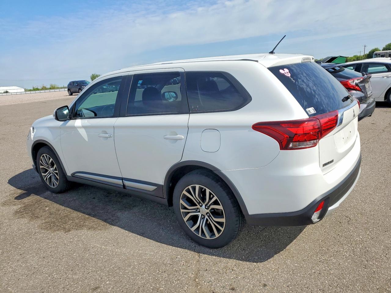 2016 Mitsubishi Outlander VIN JA4AZ3A37GZ060023 COPART salvage auction — Front End, MN - CERT OF TITLE-SALVAGE, sold $2,650 on 2026-07-09 (photo 2)