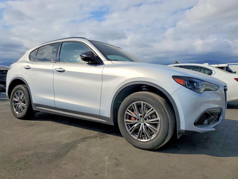 2024 Alfa romeo Stelvio VIN ZASPAJAN9R7D78468 COPART salvage auction — SIDE, Ca - Salvage Certificate, sold $10,300 on 2026-07-06 (photo 4)