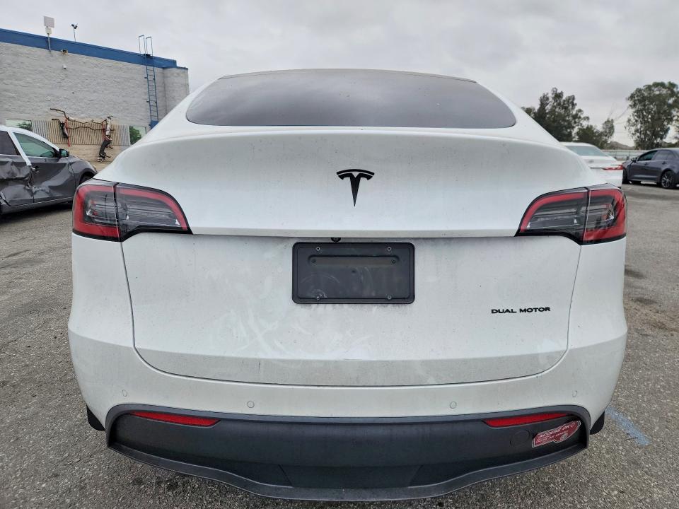 2021 Tesla Model y VIN 5YJYGDEE7MF299987 COPART salvage auction — SIDE, CA - SALVAGE CERTIFICATE, sold $150 on 2026-07-21 (photo 6)