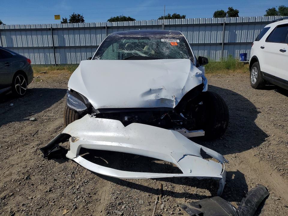 2026 Tesla Model x VIN 7SAXCDE57TF480340 COPART salvage auction — ROLLOVER, Ca - Non-Repairable Vehicle Cert, sold $2,800 on 2026-07-02 (photo 5)