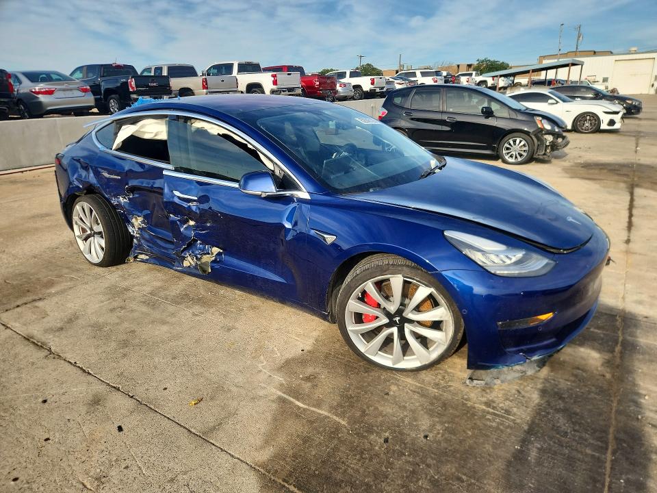 2018 Tesla VIN 5YJ3E1EB2JF106340 COPART salvage auction — SIDE, Tx - Salvage Vehicle Title, sold $4,850 on 2026-07-16 (photo 4)