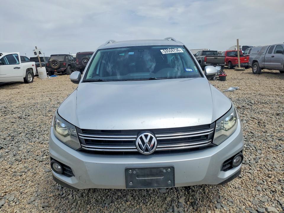 2016 Volkswagen VIN WVGAV7AX2GW606364 COPART salvage auction — SIDE, Tx - Salvage Vehicle Title, sold $1,800 on 2026-07-14 (photo 5)