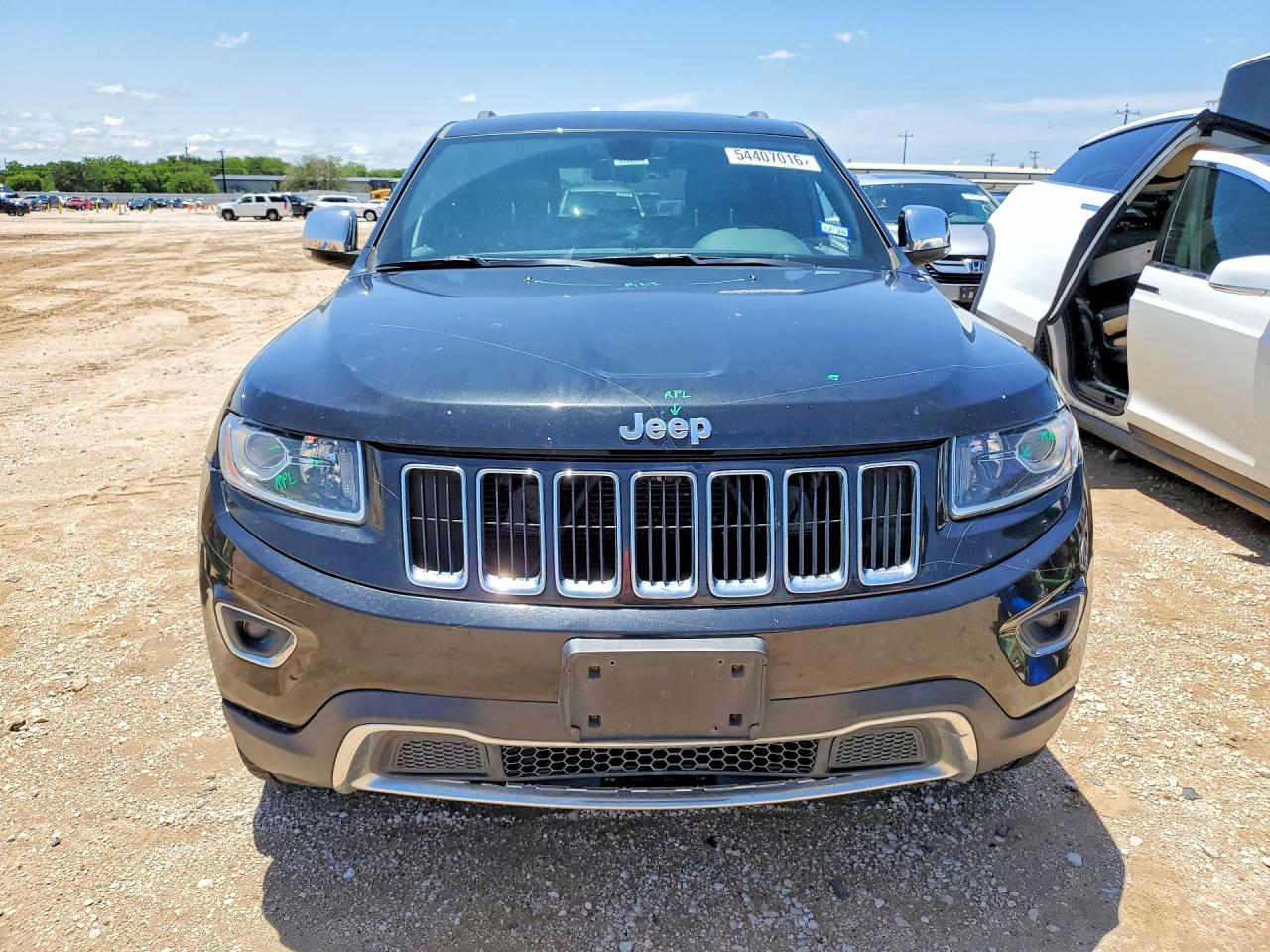 2014 Jeep Grand Cherokee VIN 1C4RJFBGXEC294305 COPART salvage auction — Vandalized, TX - SALVAGE VEHICLE TITLE, sold $3,700 on 2026-07-09 (photo 5)