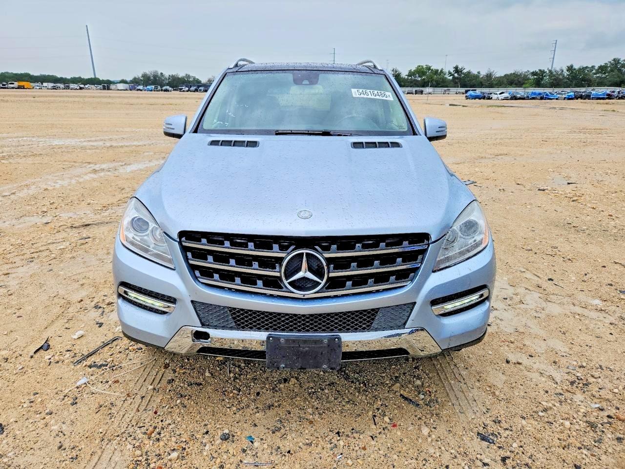2014 Mercedes-Benz ML-Class VIN 4JGDA2EB2EA325072 COPART salvage auction — Minor Dent/Scratches, FL - CERTIFICATE OF TITLE, sold $2,200 on 2026-07-02 (photo 5)