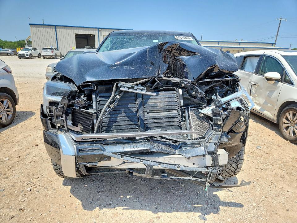 2023 Toyota Tundra VIN 5TFJC5DB0PX017712 COPART salvage auction — FRONT END, Tx - Salvage Vehicle Title, sold $17,200 on 2026-07-16 (photo 5)