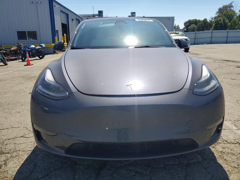 2023 Tesla Model y VIN 7SAYGDEE3PF873394 COPART salvage auction — SIDE, CA - SALVAGE CERTIFICATE, sold $13,200 on 2026-07-31 (photo 5)