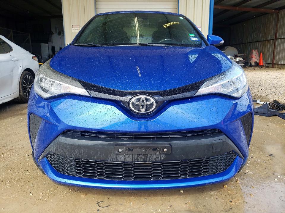 2021 Toyota C-hr VIN JTNKHMBXXM1116837 COPART salvage auction — SIDE, Tx - Salvage Vehicle Title, sold $3,500 on 2026-07-16 (photo 5)