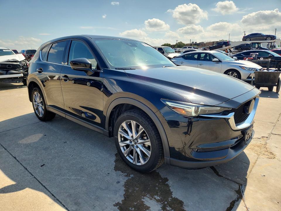 2021 Mazda Cx-5 VIN JM3KFADM3M1326666 COPART salvage auction — REAR END, TX - SALVAGE VEHICLE TITLE, sold $250 on 2026-07-30 (photo 4)