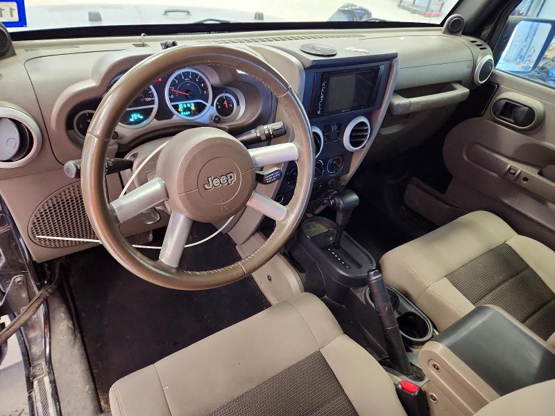 2010 Jeep Wrangler / VIN 1J4AA5D19AL158512 COPART salvage auction — MINOR DENT/SCRATCHES, Tx - Certificate Of Title, sold $3,200 on 2026-07-07 (photo 8)