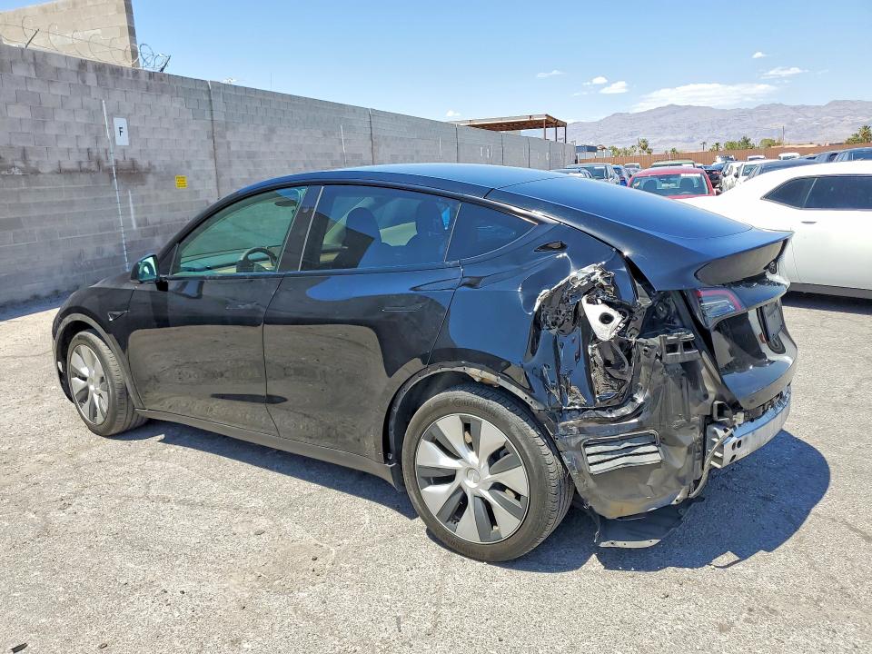 2023 Tesla Model y VIN 7SAYGDEE2PF813543 COPART salvage auction — REAR END, Nv - Salvage Title, sold $9,800 on 2026-07-06 (photo 2)