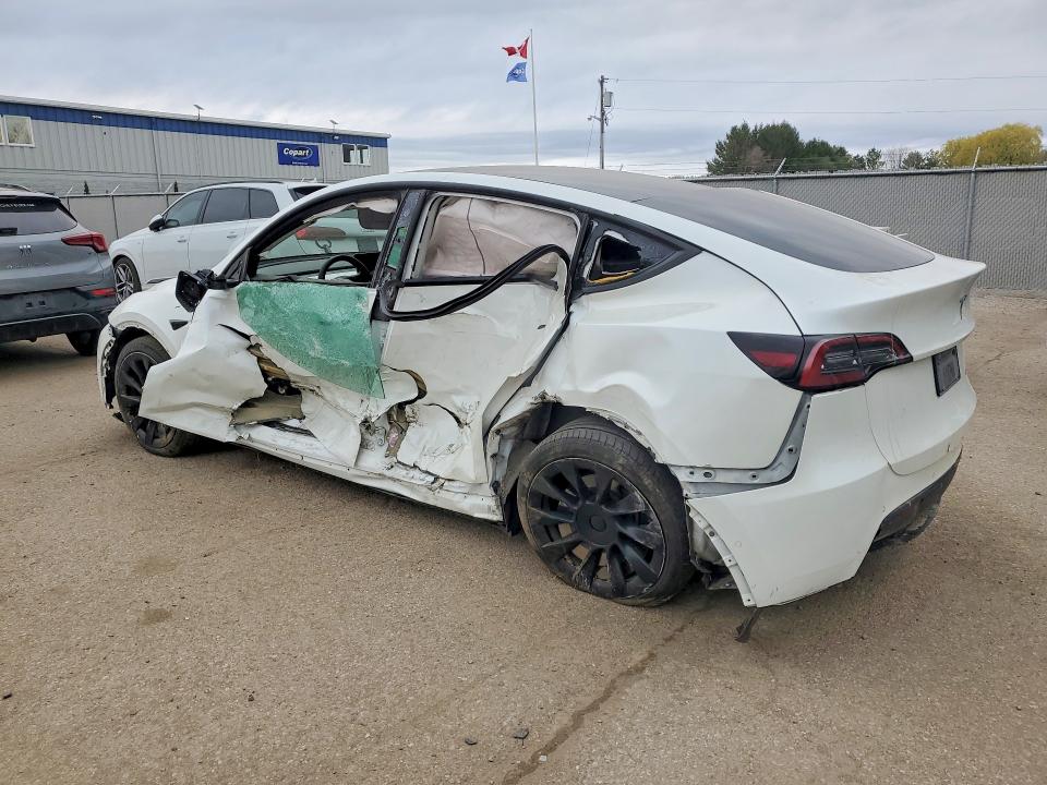 2022 Tesla Model y VIN 7SAYGDEE8NF361840 COPART salvage auction — SIDE, On - Permit Salvage, sold $5,700 on 2026-07-07 (photo 2)
