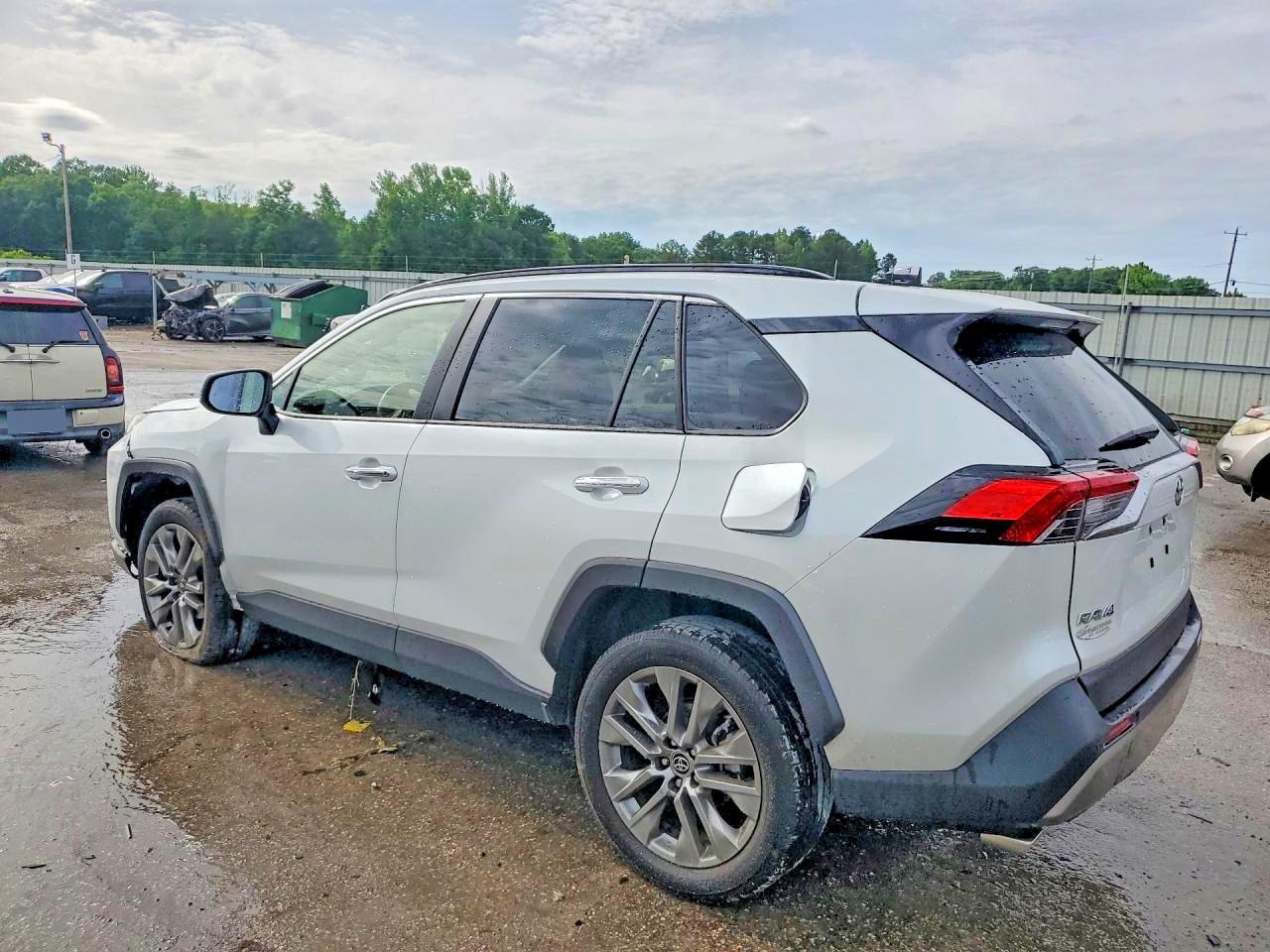 2023 Toyota RAV4 VIN JTMY1RFV3PD104931 COPART salvage auction — Side, AL - CERT OF TITLE-SALVAGE TITLE, sold $11,200 on 2026-07-02 (photo 2)