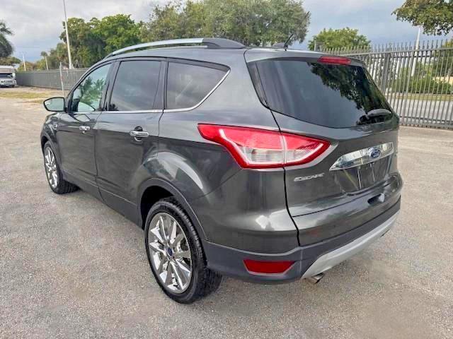 2016 Ford Escape VIN 1FMCU0GX4GUC35892 COPART salvage auction — MINOR DENT/SCRATCHES, Fl - Certificate Of Destruction (P), sold $3,900 on 2026-07-09 (photo 2)