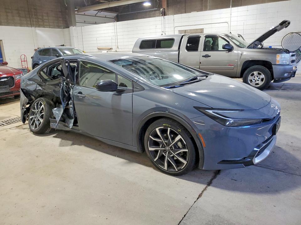 2025 Toyota Prius VIN JTDACACU0S3049264 COPART salvage auction — SIDE, Mn - Cert Of Title-Salvage, sold $9,700 on 2026-07-07 (photo 4)