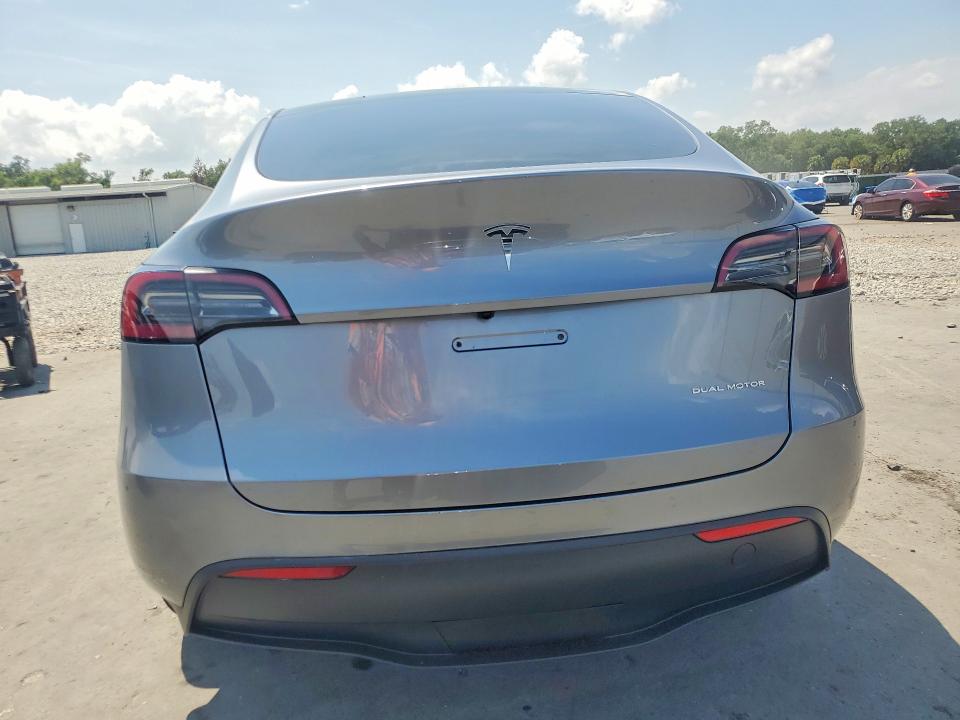2024 Tesla Model y VIN 7SAYGDEEXRA320838 COPART salvage auction — MINOR DENT/SCRATCHES, Tx - Certificate Of Title (P), sold $20,600 on 2026-07-13 (photo 6)