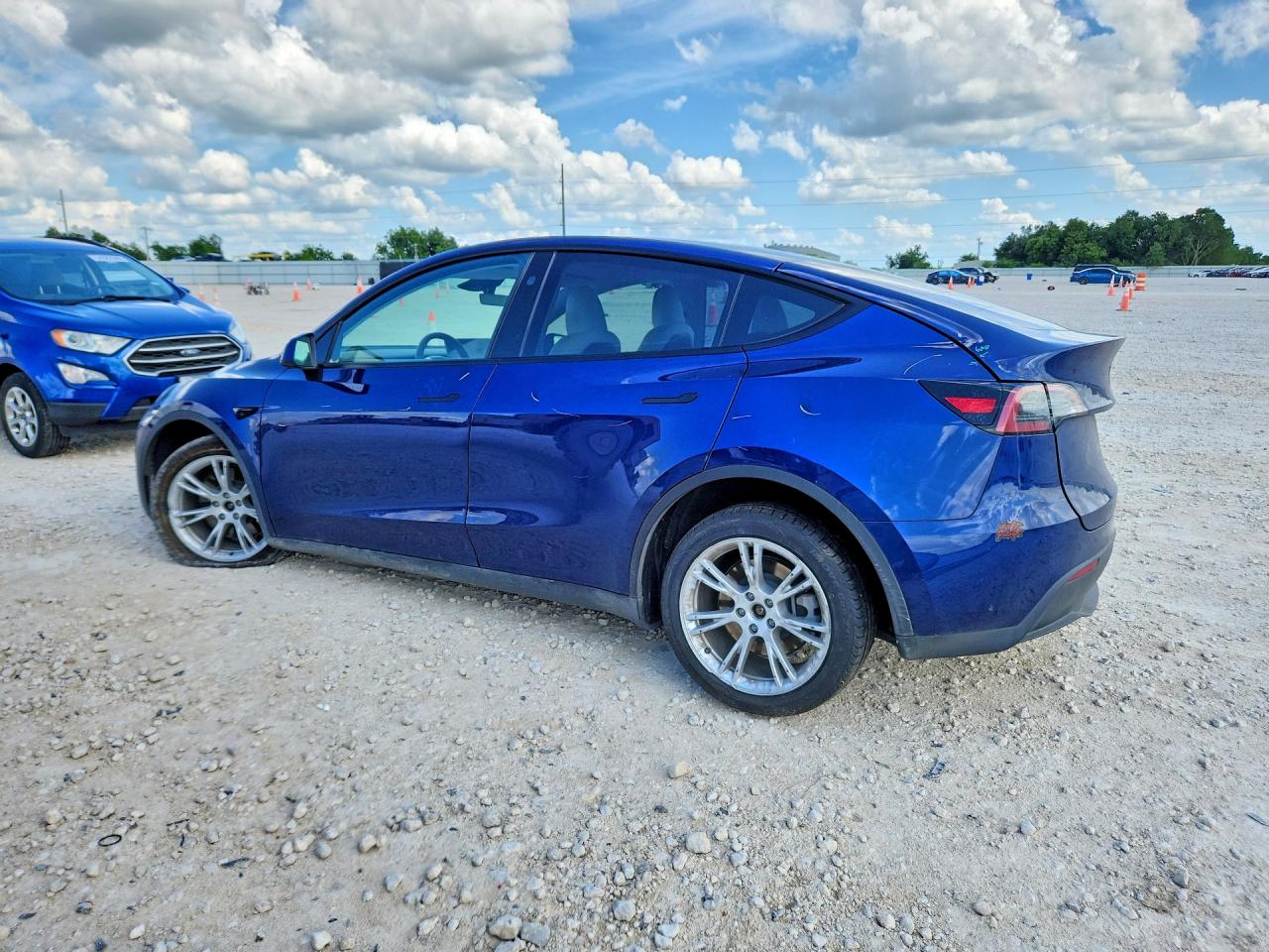 2024 Tesla Model Y VIN 7SAYGAEE0RF019822 COPART salvage auction — Undercarriage, TX - SALVAGE VEHICLE TITLE, sold $13,300 on 2026-07-09 (photo 2)
