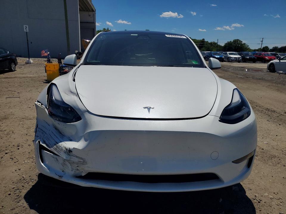 2024 Tesla Model y VIN 7SAYGAEE6RF167456 COPART salvage auction — REAR END, VA - CERT OF TITLE - SALVAGE, sold $9,900 on 2026-07-08 (photo 5)