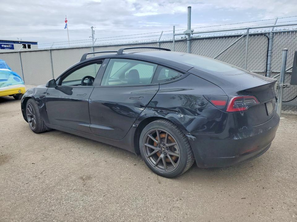 2021 Tesla Model 3 VIN 5YJ3E1EA6MF016944 COPART salvage auction — SIDE, On - Permit No Brand - Unfit, sold $7,200 on 2026-07-16 (photo 2)