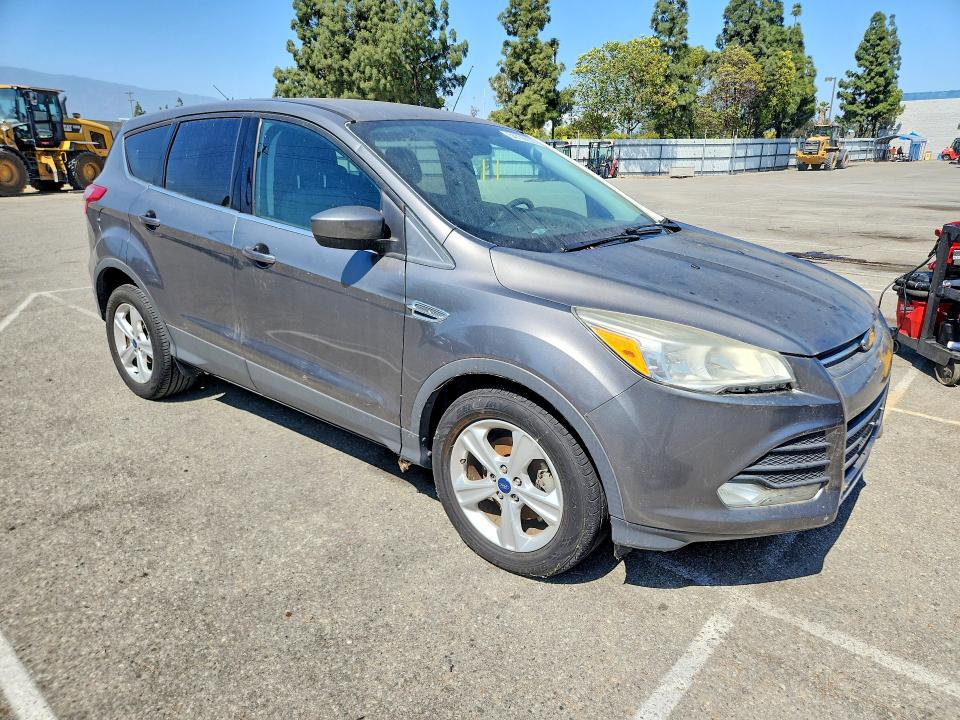 2014 Ford VIN 1FMCU0GX2EUD03118 COPART salvage auction — NORMAL WEAR, Ca - Dis/Dlr/Exp Only Clean Title, sold $975 on 2026-07-03 (photo 4)