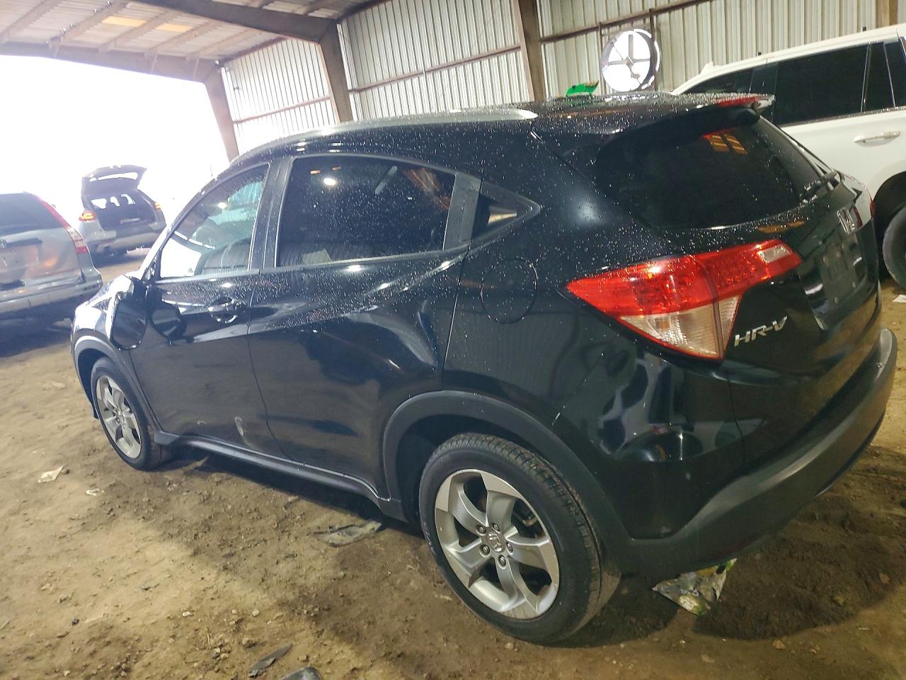 2016 Honda HR-V VIN 3CZRU6H70GM767283 COPART salvage auction — Water/Flood, TX - SALVAGE TITLE-FLOOD DAMAGE, sold $2,800 on 2026-06-29 (photo 2)