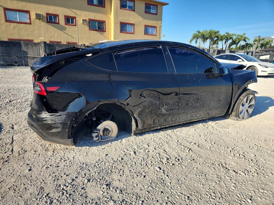 2024 Tesla Model y VIN 7SAYGDED7RF095045 COPART salvage auction — ALL OVER, Fl - Certificate Of Destruction, sold $3,150 on 2026-07-31 (photo 3)