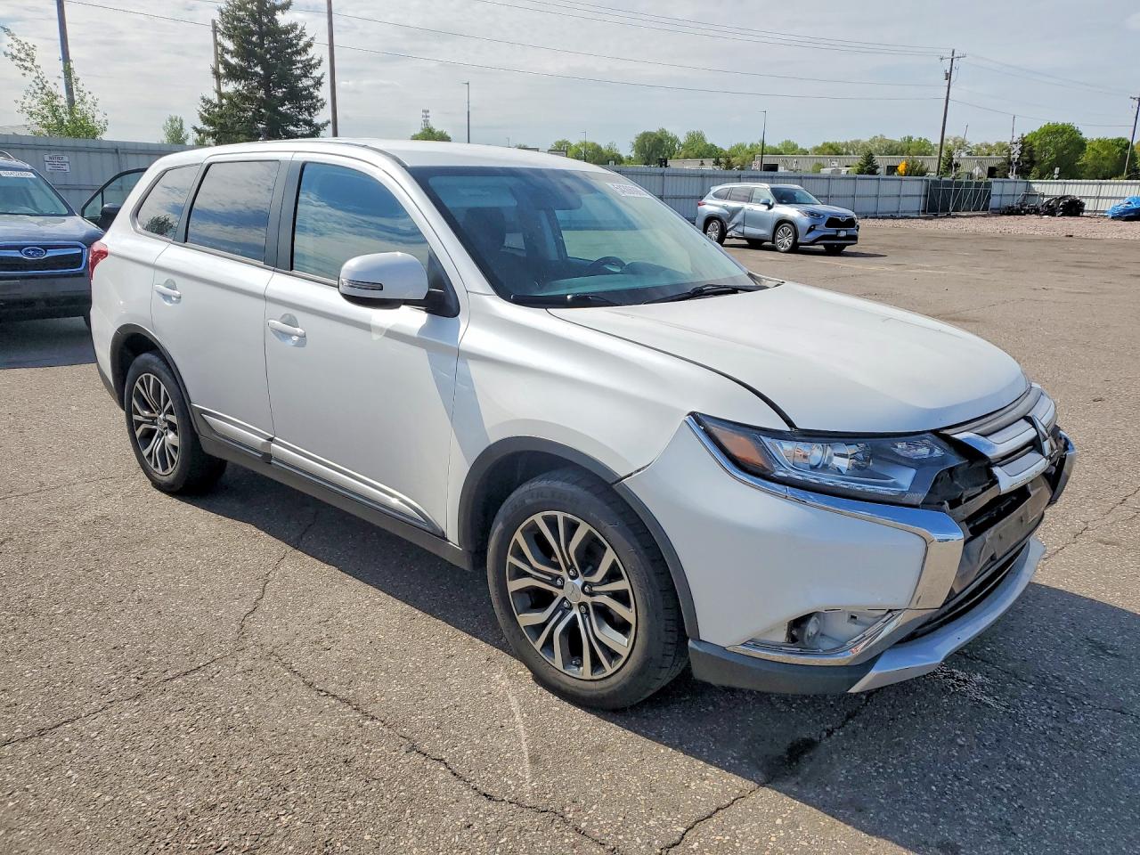 2016 Mitsubishi Outlander VIN JA4AZ3A37GZ060023 COPART salvage auction — Front End, MN - CERT OF TITLE-SALVAGE, sold $2,650 on 2026-07-09 (photo 4)