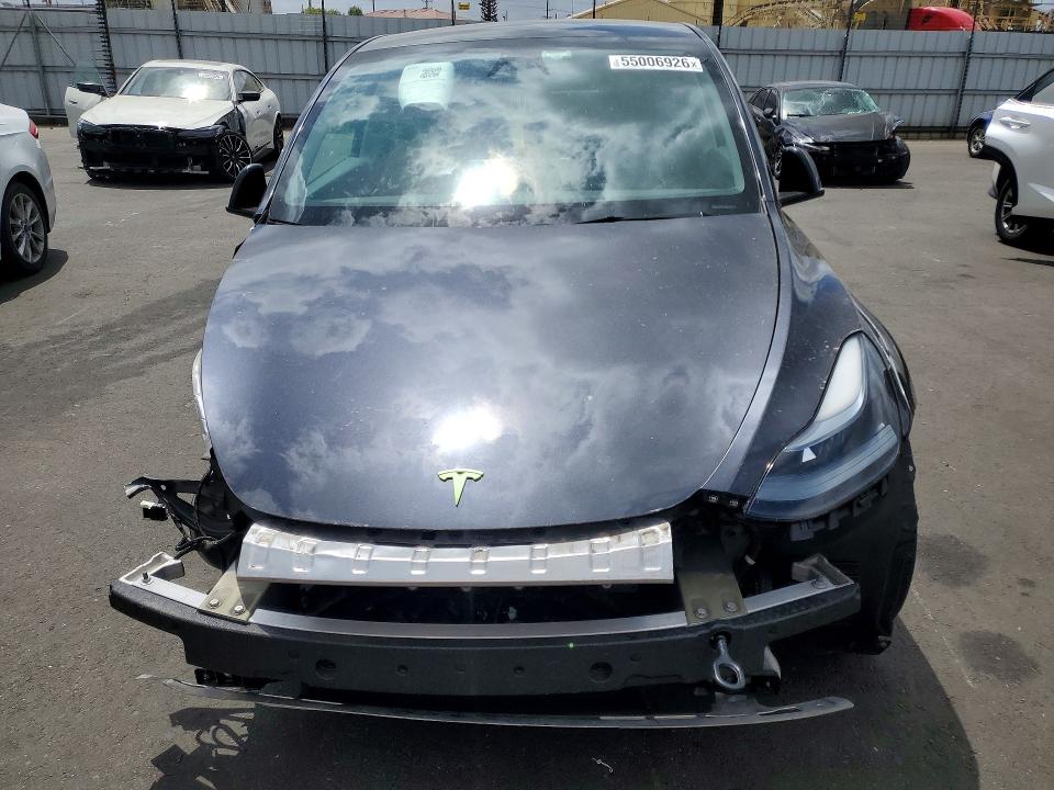 2024 Tesla Model y VIN 7SAYGDEE6RF159293 COPART salvage auction — FRONT END, Ca - Salvage Certificate, sold $10,700 on 2026-07-27 (photo 5)