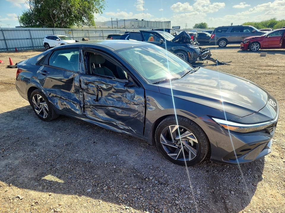 2025 Hyundai Elantra VIN KMHLM4DG2SU059090 COPART salvage auction — SIDE, Tx - Salvage Vehicle Title, sold $5,000 on 2026-07-22 (photo 4)