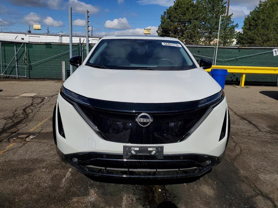 2024 Nissan Ariya VIN JN1BF0BA1RM432070 COPART salvage auction — SIDE, Co - Salvage Title, sold $325 on 2026-07-28 (photo 5)