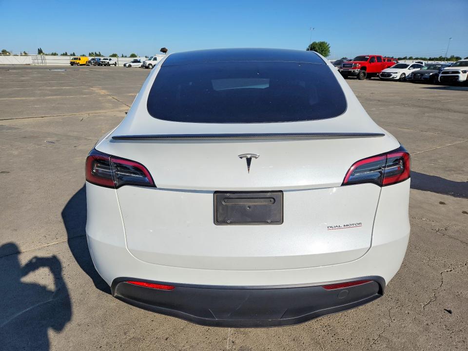 2024 Tesla Model y VIN 7SAYGDEF1RF181551 COPART salvage auction — FRONT END, Ca - Salvage Certificate, sold $13,100 on 2026-07-13 (photo 6)