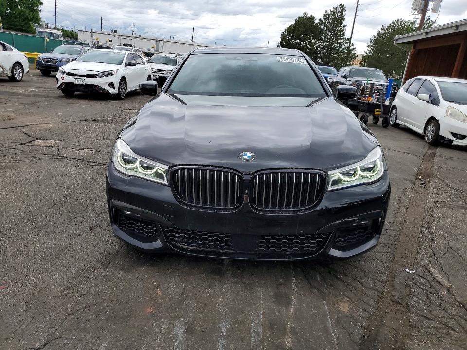 2017 BMW 7er VIN WBA7F0C32HGM21673 COPART salvage auction — SIDE, Co - Public - Salvage Title, sold $9,500 on 2026-07-07 (photo 5)