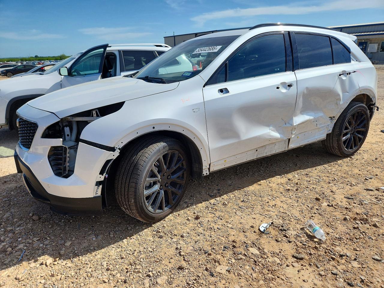 2022 Cadillac XT4 VIN 1GYFZER42NF113627 COPART salvage auction — Side, TX - SALVAGE VEHICLE TITLE, sold $6,400 on 2026-07-09 (photo 1)