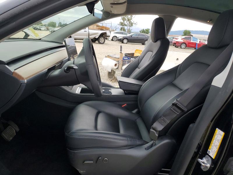 2023 Tesla Model y VIN 7SAYGDEE9PF812518 COPART salvage auction — SIDE, CA - SALVAGE CERTIFICATE, sold $9,000 on 2026-08-27 (photo 7)