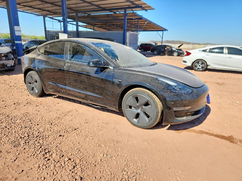 2023 Tesla Model 3 VIN 5YJ3E1EA4PF460120 COPART salvage auction — Rear End, AZ - CERT OF TITLE - SALVAGE, sold $6,000 on 2026-06-18 (photo 4)
