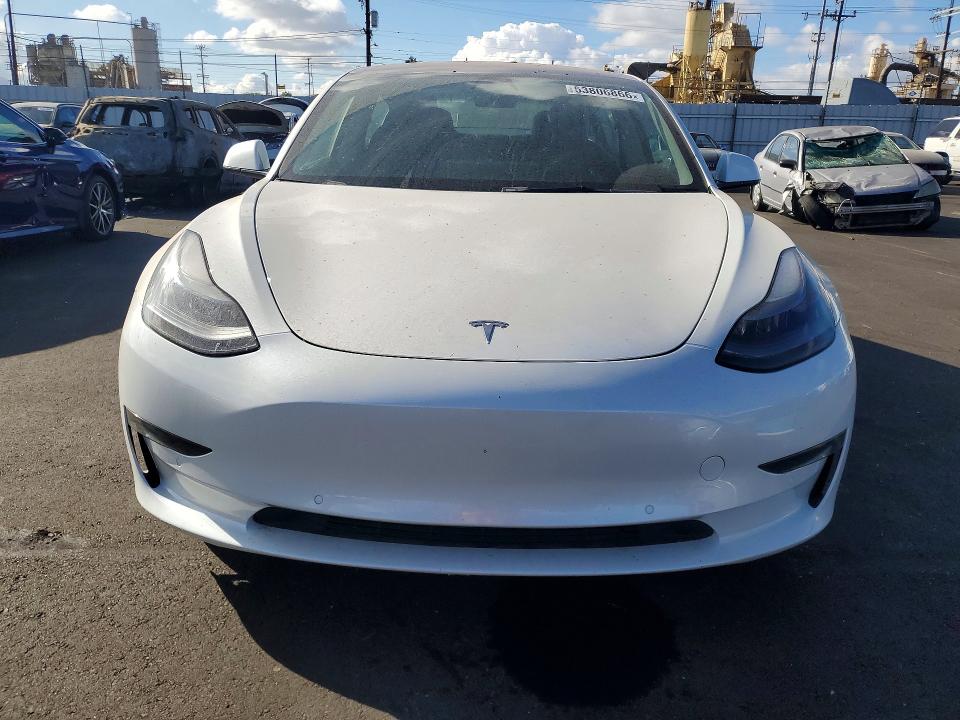 2022 Tesla Model 3 VIN 5YJ3E1EB8NF137548 COPART salvage auction — MINOR DENT/SCRATCHES, Ca - Salvage Certificate, sold $14,400 on 2026-07-06 (photo 5)