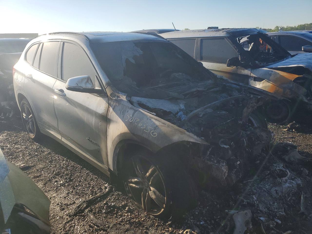 2017 BMW X1 VIN WBXHT3C31H5F80025 COPART salvage auction — Burn, MO - DEALER ONLY CLEAN TITLE, sold $4,500 on 2026-07-09 (photo 4)