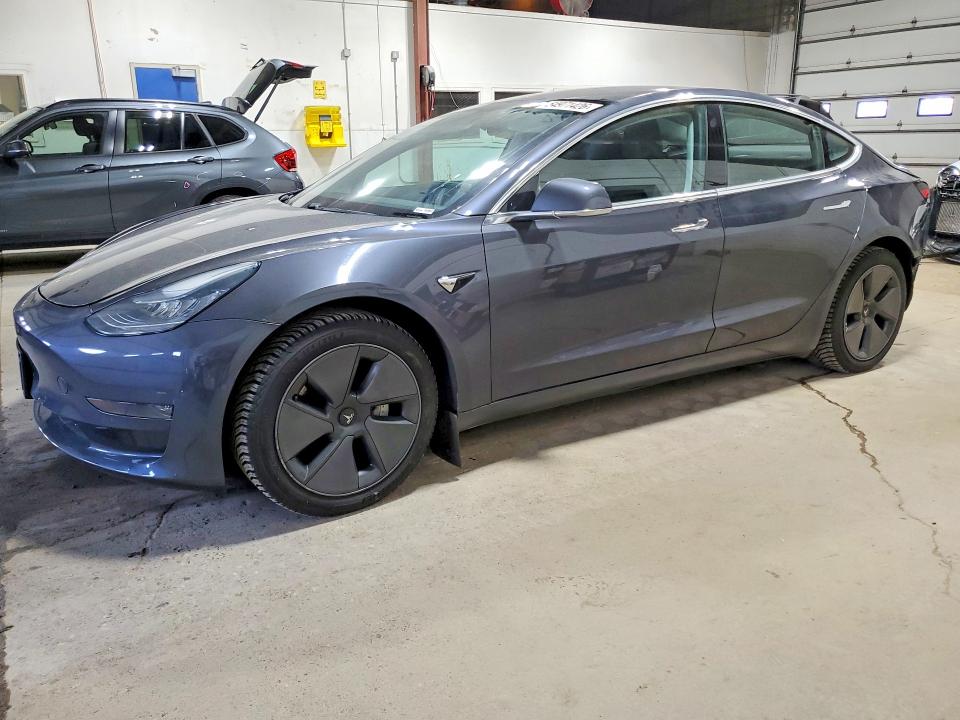 2018 Tesla Model 3 VIN 5YJ3E1EB3JF130422 COPART salvage auction — REAR END, Mn - Cert Of Title-Salvage, sold $5,500 on 2026-07-02 (photo 1)