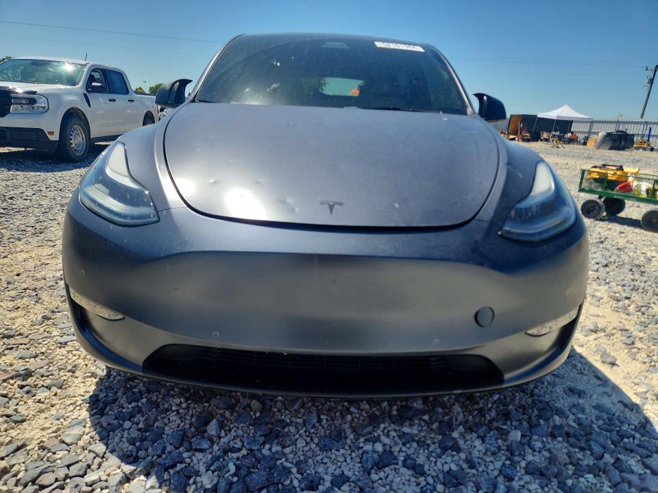 2022 Tesla Model y VIN 7SAYGDEF6NF336573 COPART salvage auction — HAIL, Mo - Certificate Of Title, sold $15,800 on 2026-07-08 (photo 5)