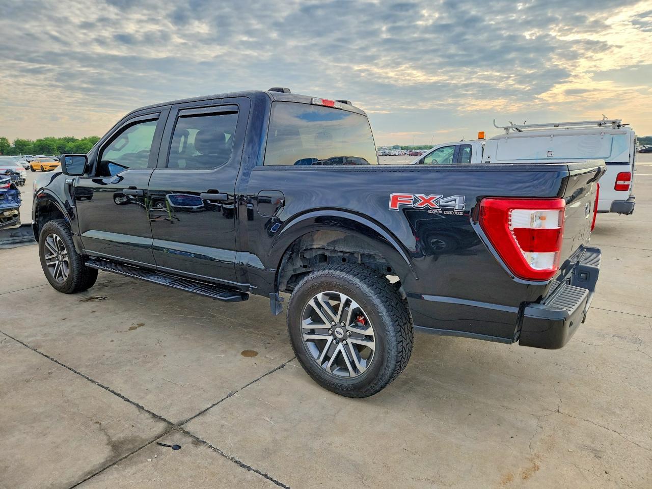 2021 Ford F-150 Lightning VIN 1FTEW1EP9MFB93316 COPART salvage auction — Hail, TX - CERTIFICATE OF TITLE, sold $10,100 on 2026-07-09 (photo 2)