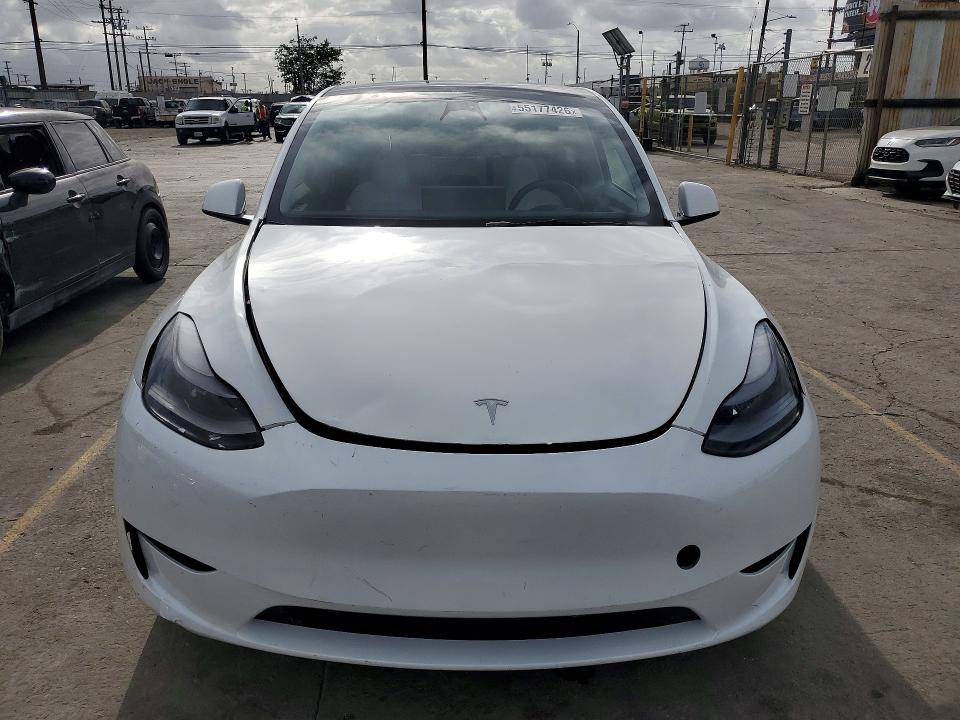 2023 Tesla Model y VIN 7SAYGDEF5PF738880 COPART salvage auction — FRONT END, Az - Dis/Dlr/Exp Only Salvage Title, sold $12,600 on 2026-07-27 (photo 5)
