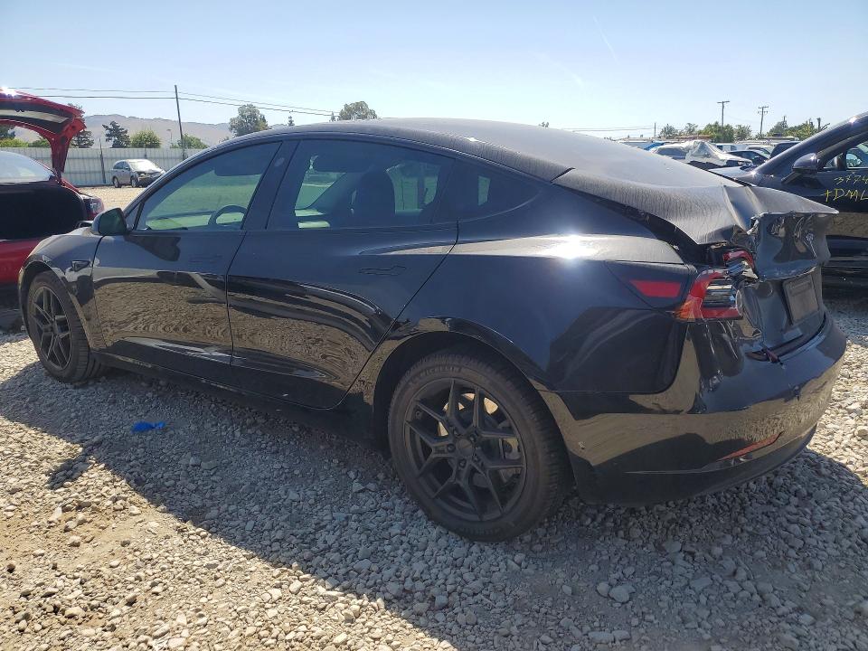 2023 Tesla Model 3 VIN 5YJ3E1EA7PF590263 COPART salvage auction — REAR END, Ca - Salvage Certificate, sold $6,600 on 2026-07-07 (photo 2)