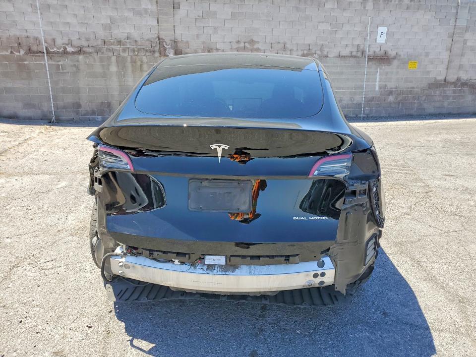 2023 Tesla Model y VIN 7SAYGDEE2PF813543 COPART salvage auction — REAR END, Nv - Salvage Title, sold $9,800 on 2026-07-06 (photo 6)
