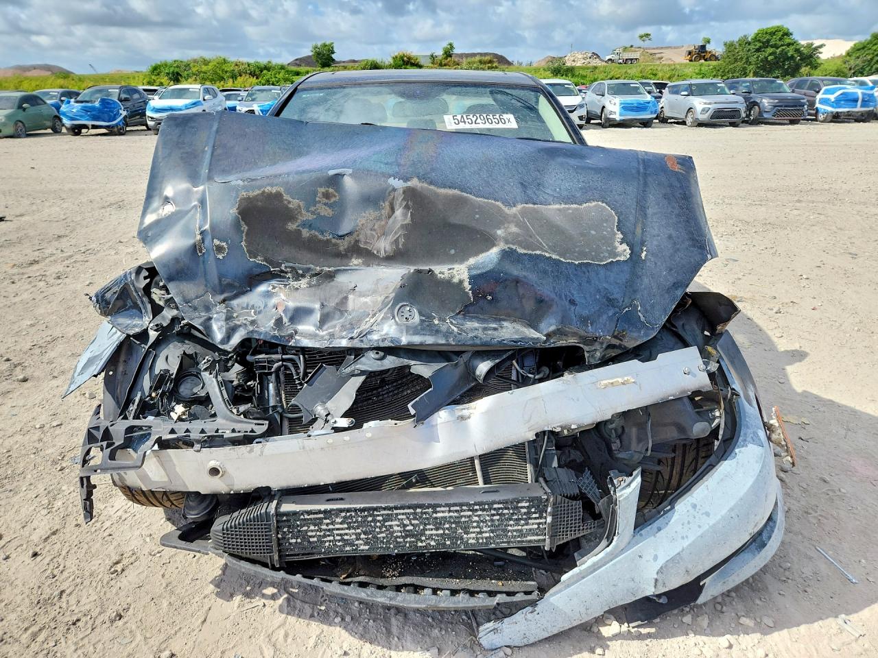 2014 Mercedes-Benz C-Class VIN WDDGF4HBXEG233768 COPART salvage auction — Front End, FL - CERT OF TITLE-REBUILT, sold $275 on 2026-06-30 (photo 5)